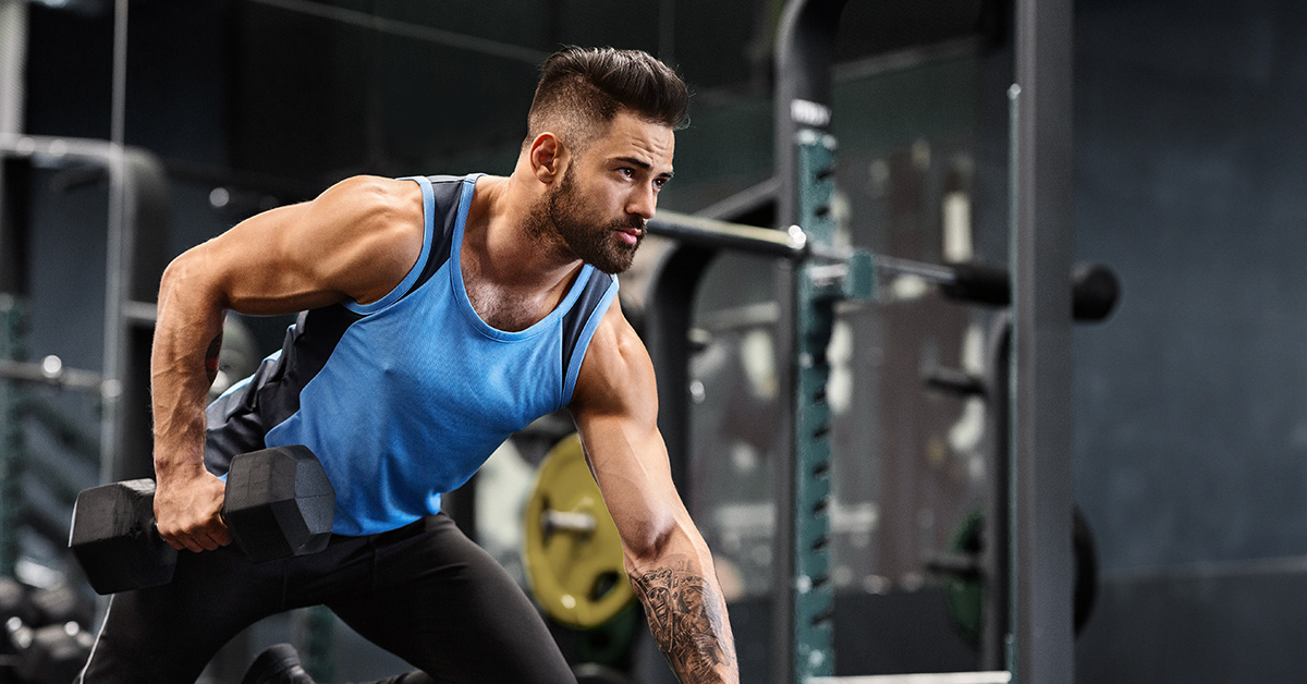 Man at the gym doing exercises