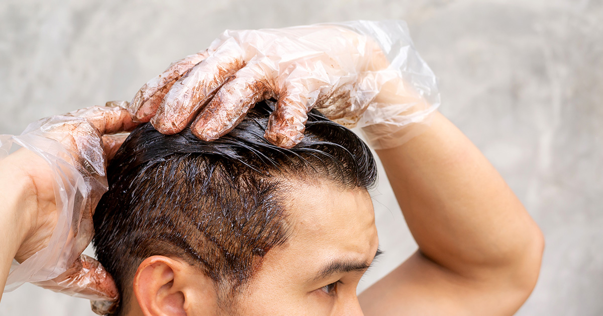 a man dyeing his hair